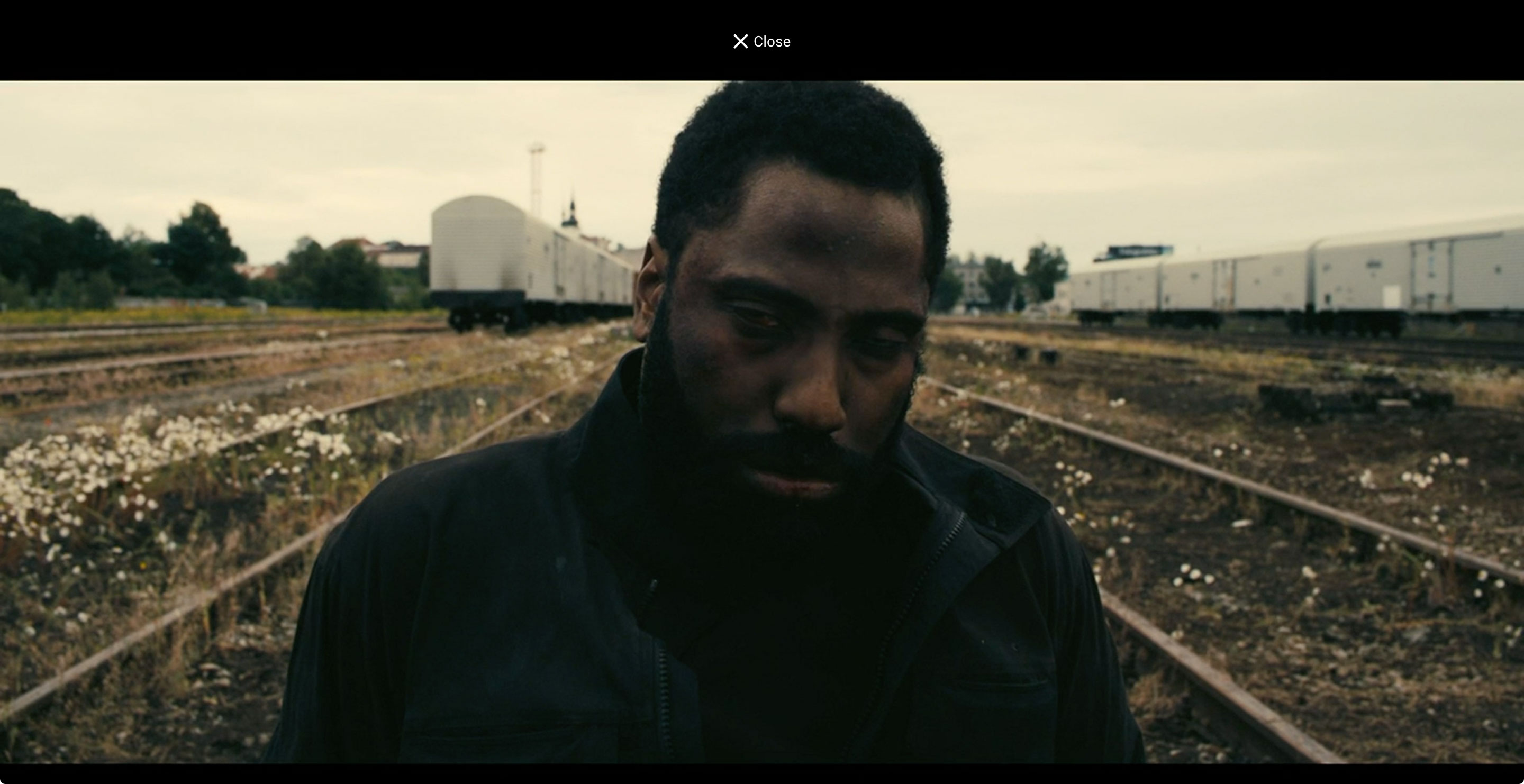 Movie Release Calendar movie trailer view Tenant movie, close up of lead actor's face suffering after being beaten.